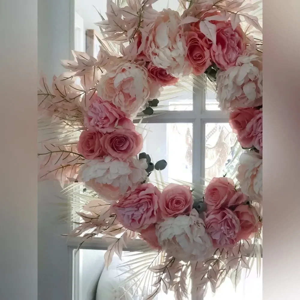 Whispy palm fronds beachy blooming tropical blush + coral grapevine wreath